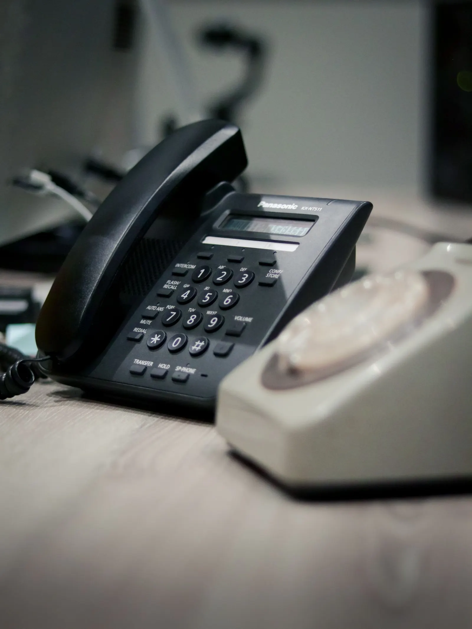 Desk telephones in an office