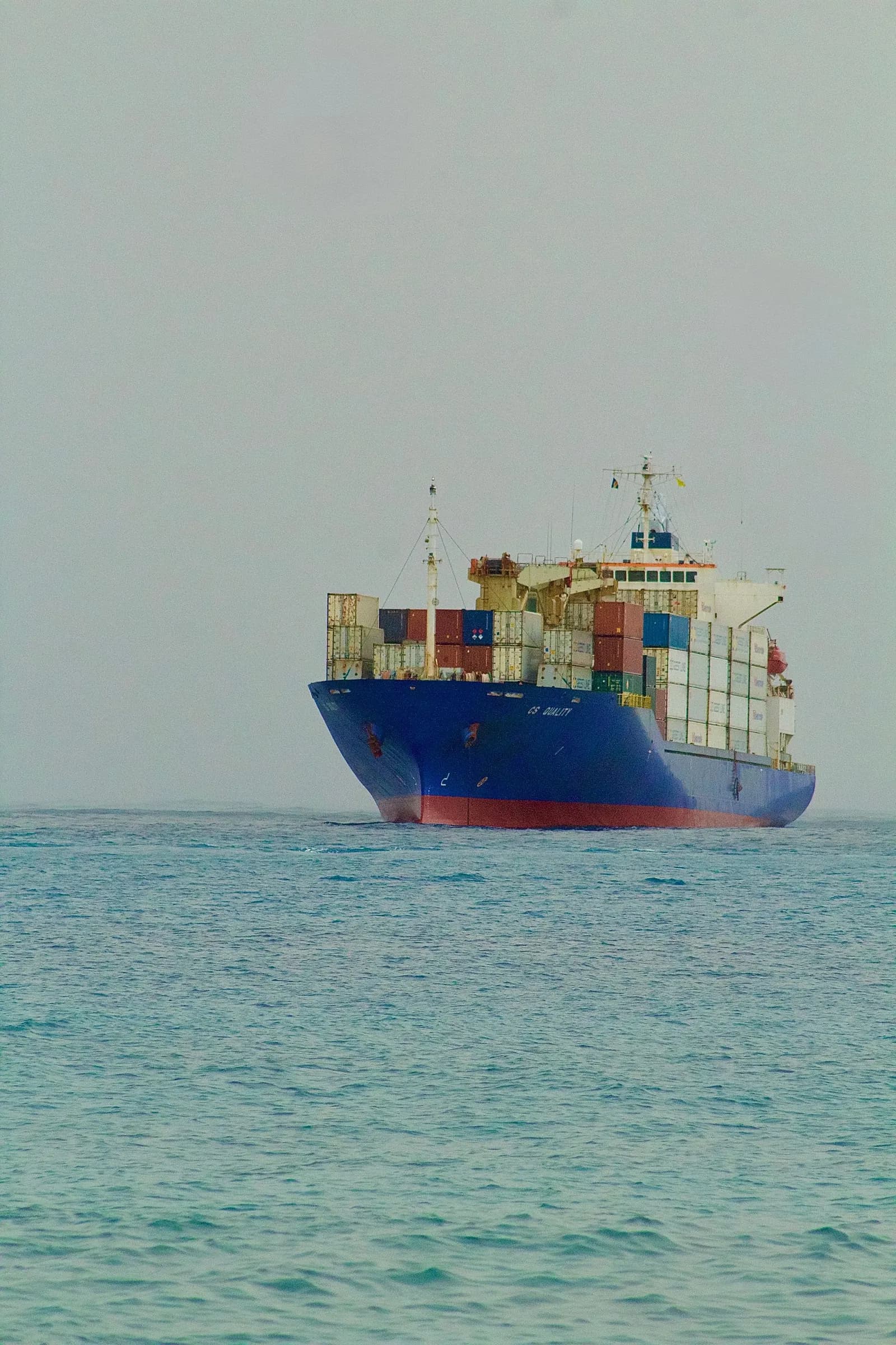 Container ship sailing on the open sea